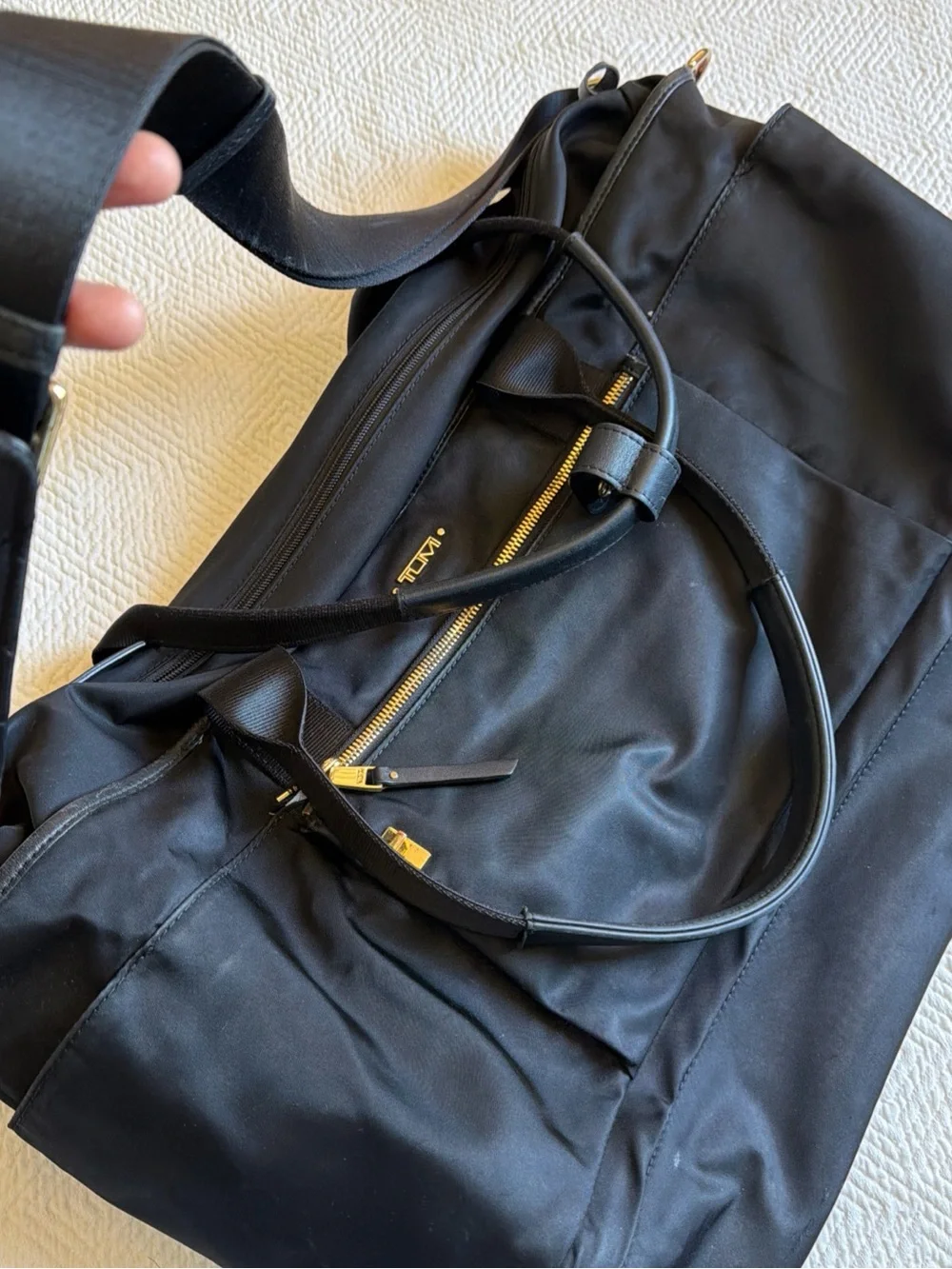 Tumi Black Duffel Bag with Gold Hardware